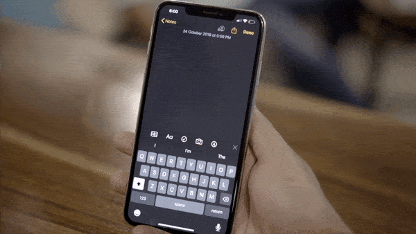 GIF of paste gesture which is like sprinkling salt on the screen with three fingers.